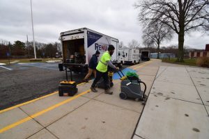 RENU Contracting Restoration team responding to a flooding emergency with professional drying equipment