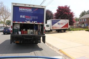 RENU Contracting Restoration crew preparing equipment for urgent fire damage restoration cleanup.